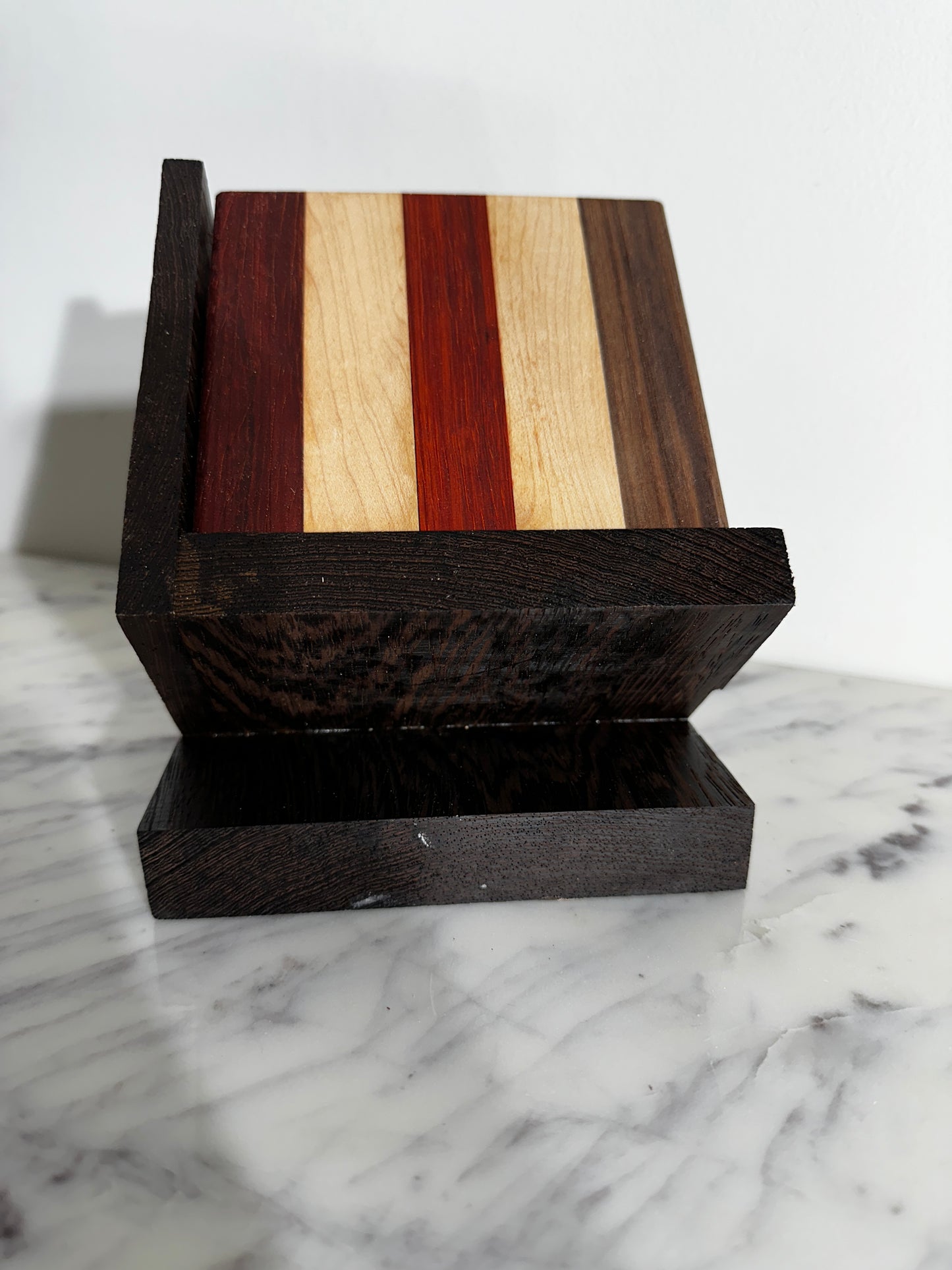 set of 3 Walnut, Paduak and Maple Coasters with modern Wenge Stand